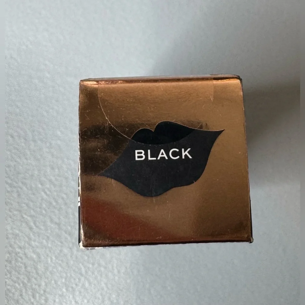 Revolution retired enchanted kiss lipstick with butterfly ring in black